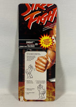 Charger l'image dans la galerie, Street Fighter – Carton arrière Sagat (vintage  bilingue)⠀⠀⠀⠀⠀⠀⠀⠀⠀⠀⠀⠀⠀⠀⠀
